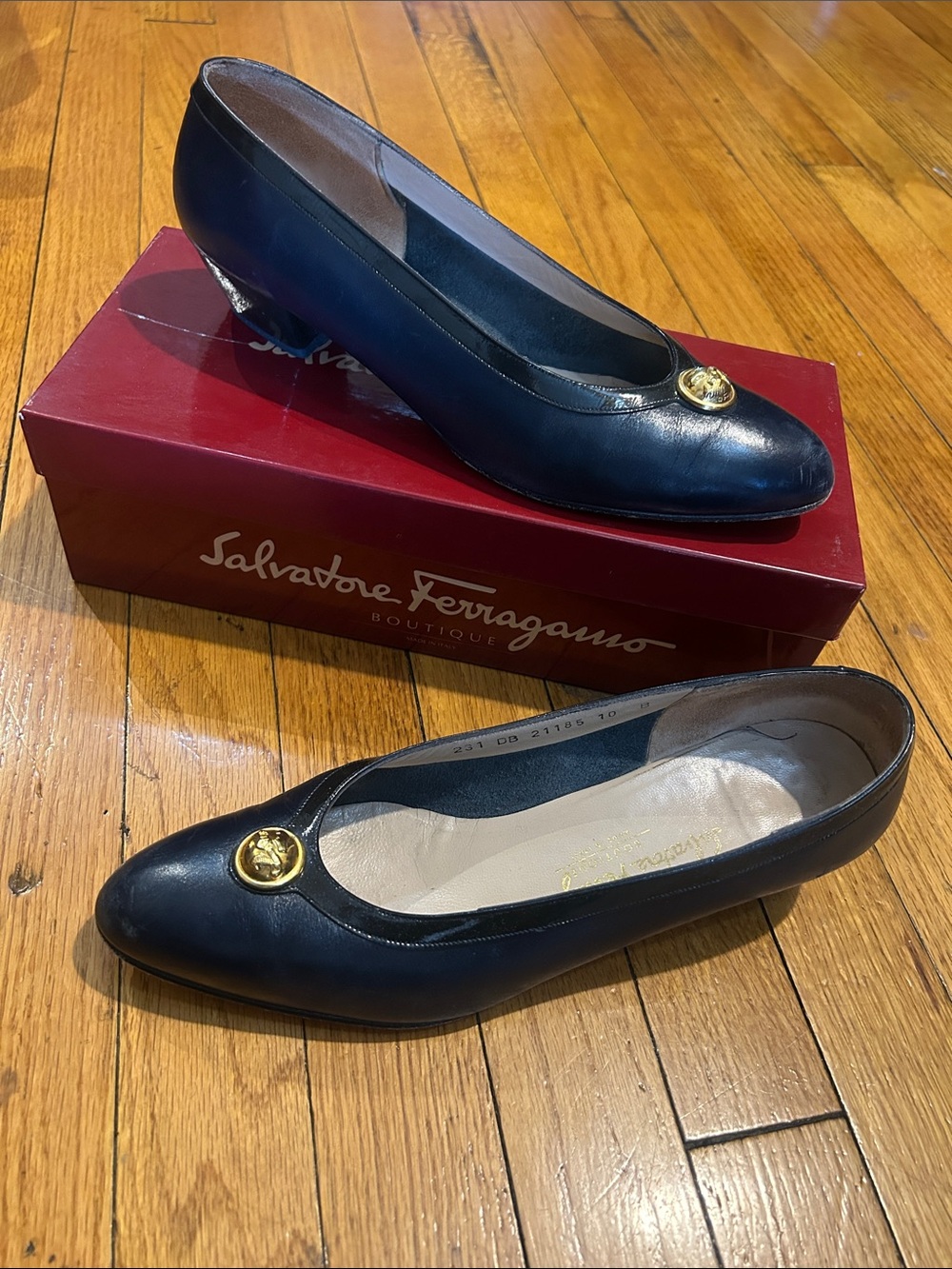 Salvatore Ferragamo Navy Leather Ballet Flats with Gold Coin Emblem